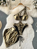 Women's hollow-out halter bodysuit and sheath skirt set by Showlu Fashion, featuring stylish cutouts and a fitted silhouette.