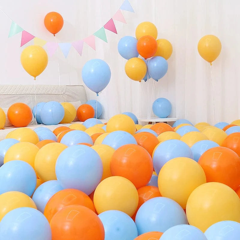 Six blue and white macaron-shaped balloons in a birthday and celebration scene for decorations.