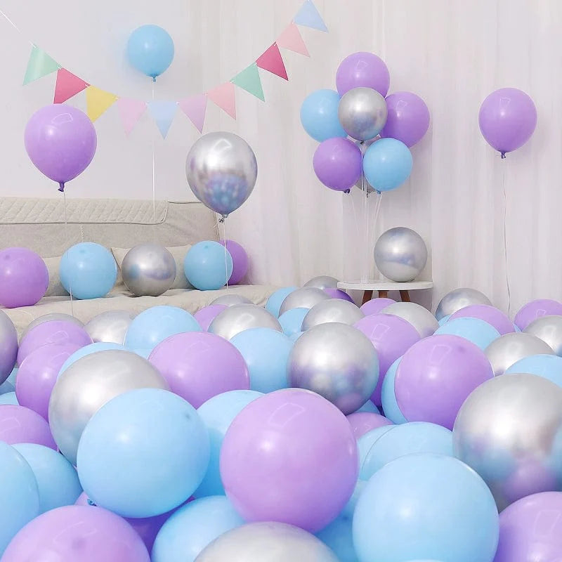 Six blue and white macaron-shaped balloons in a birthday or celebration decoration scene, perfect for graduation or kindergarten events.