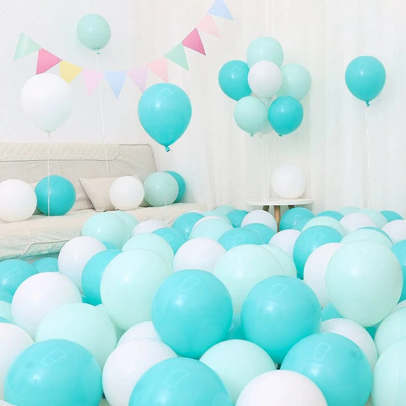 Set of six blue and white Showlu Macaron balloons for birthday or graduation decoration, arranged in a festive display scene.