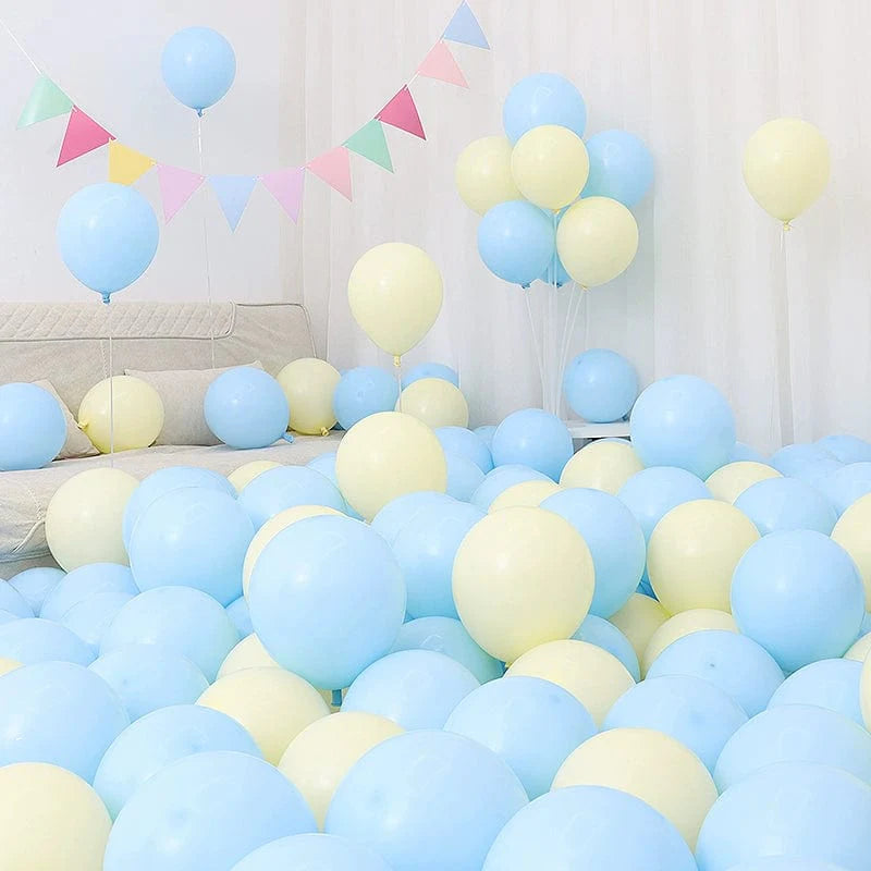 Six blue and white macaron-shaped balloons in a birthday and graduation decoration scene, featuring blue and white balloons by Showlu Fashion Store.