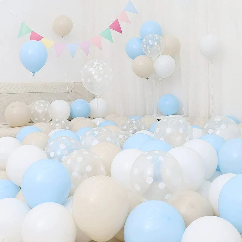 Six blue and white macaron-shaped balloons in a birthday and graduation decoration scene, featuring dark and light blue hues.