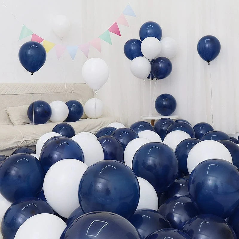 Six blue and white macaron-shaped balloons from Showlu Macaron Blue Balloon Set, ideal for birthday or graduation decorations.