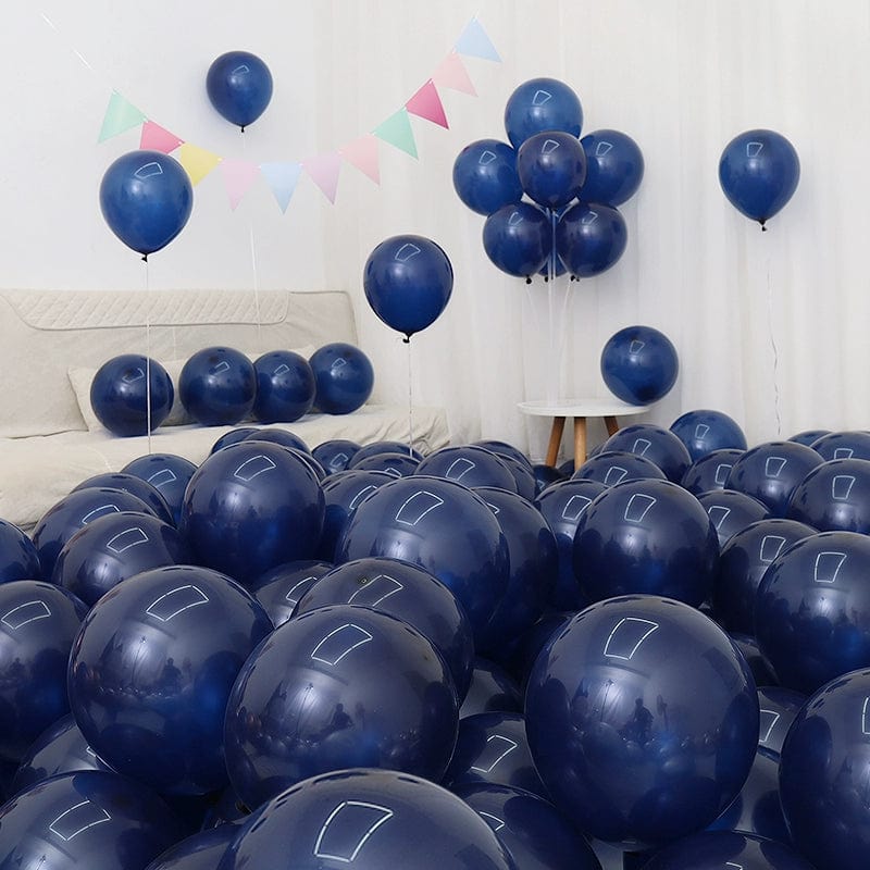 Showlu Macaron Blue Balloon Set with dark and light blue and white balloons, perfect for birthday or graduation decorations.