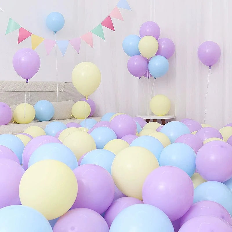 Showlu Macaron Blue Balloon Set with dark and light blue balloons for birthday or graduation decorations on a festive scene.