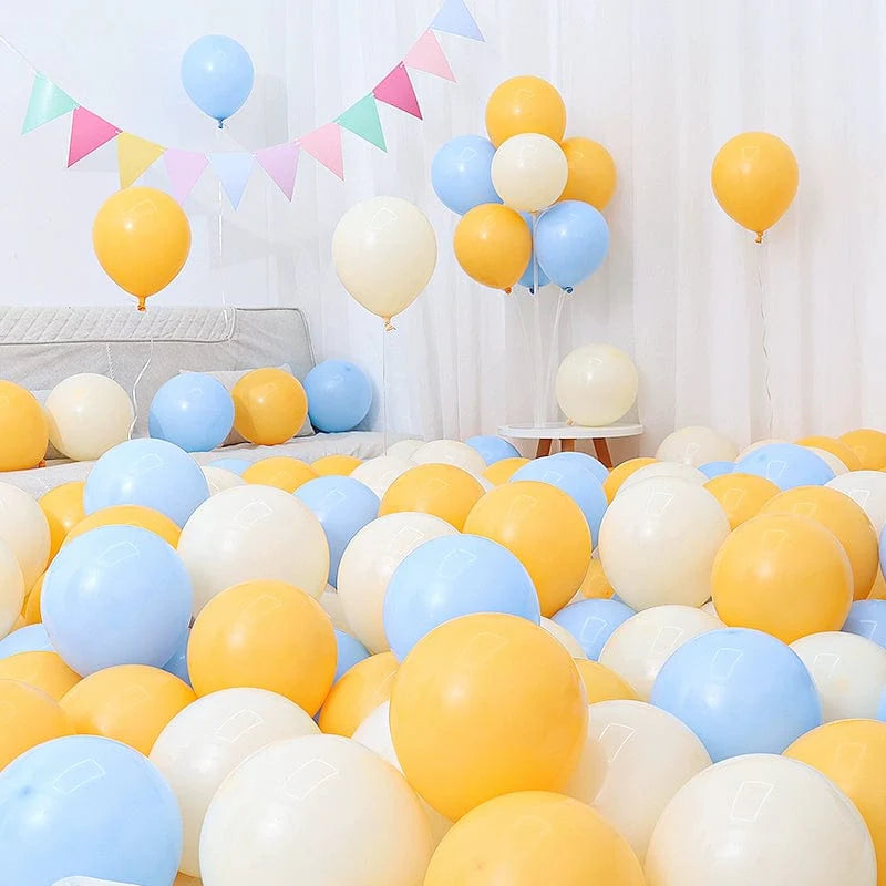 Six blue and white macaron-shaped balloons in dark and light blue, perfect for birthday or graduation decorations.