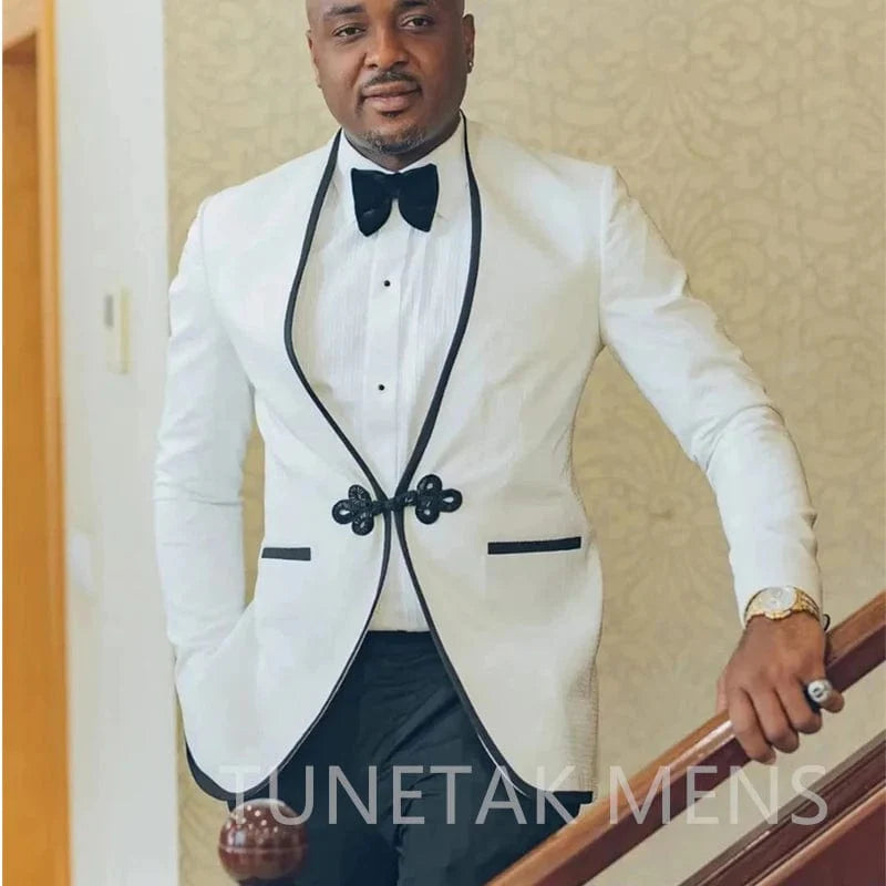 Beige men's slim fit 2-piece tuxedo with notched lapel, featuring jacket and pants, ideal for wedding or formal occasions.