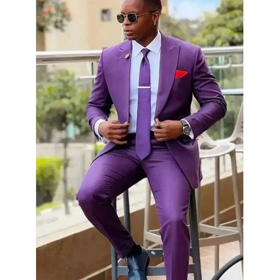 Slim fit men's two-piece suit by SHOWLU, featuring a single-breasted wool blend tuxedo with lapel, tailored for a handsome look.