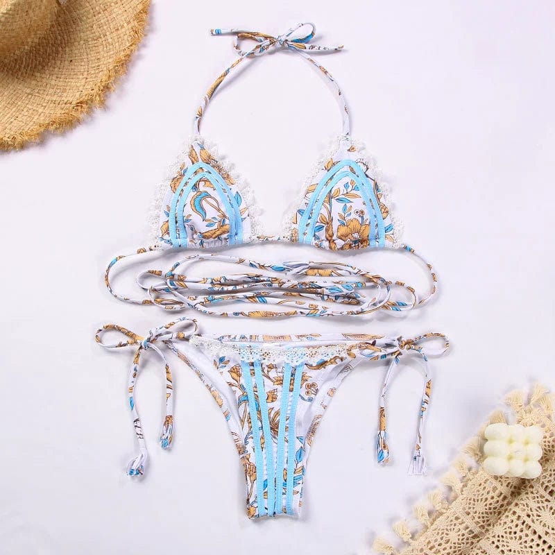 Showlu Fashion women's printed hollow-out triangle bikini swimsuit with slimming design and vibrant pattern, perfect for beachwear.