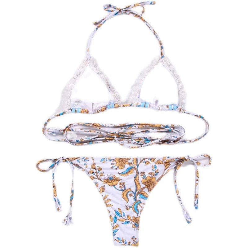 Showlu Fashion women's printed hollow-out triangle bikini swimsuit with slimming design, featuring a stylish pattern and cut-out details.