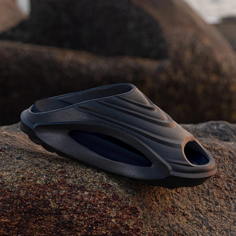 Showlu men's lightweight EVA beach slippers with breathable holes, anti-skid soles, casual design, perfect for summer and beach wear.