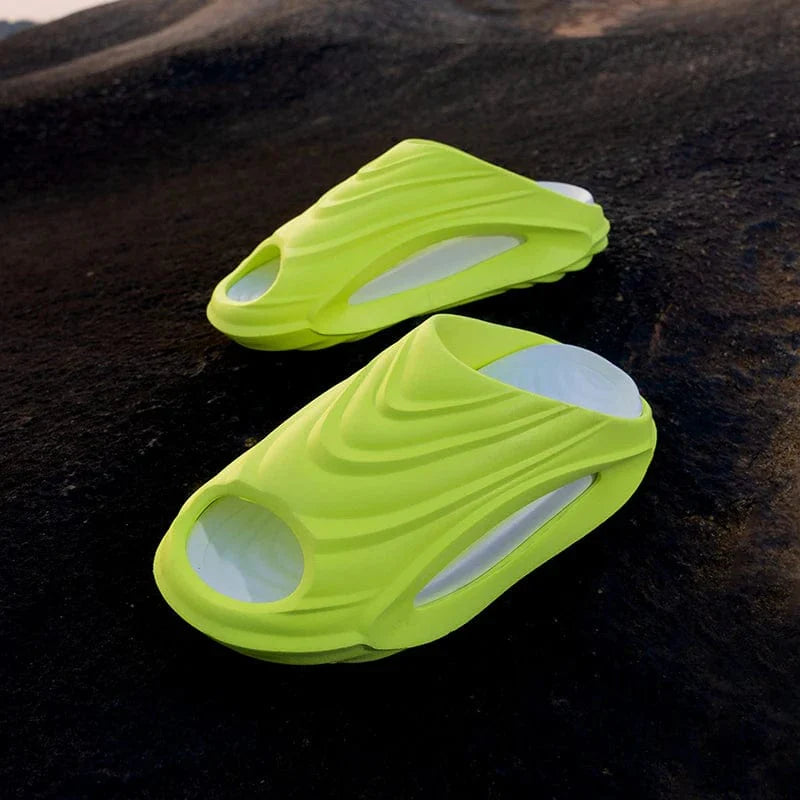 Showlu men's lightweight EVA beach slippers with anti-skid soles, breathable open-hole design, casual and durable for summer wear.