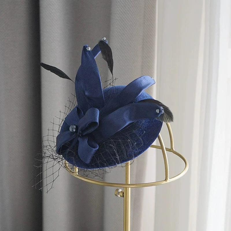 Showlu Fashion black mesh headdress worn by a female, styled with a cheongsam and top hat for elegant socialite fashion.