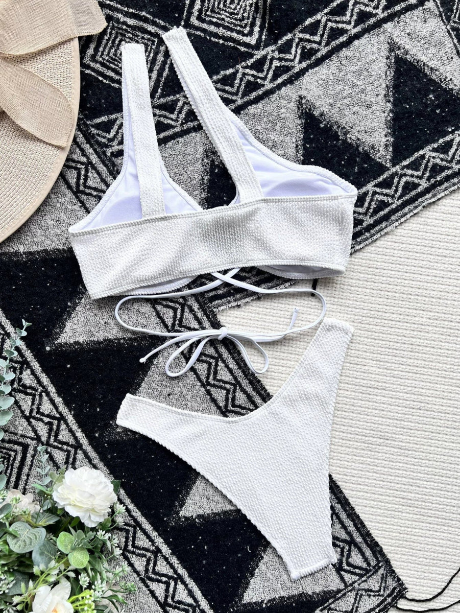 Showlu Plus Size Hollow-Out Triangle Bikini with high-waist design in solid color, perfect for stylish swimwear.