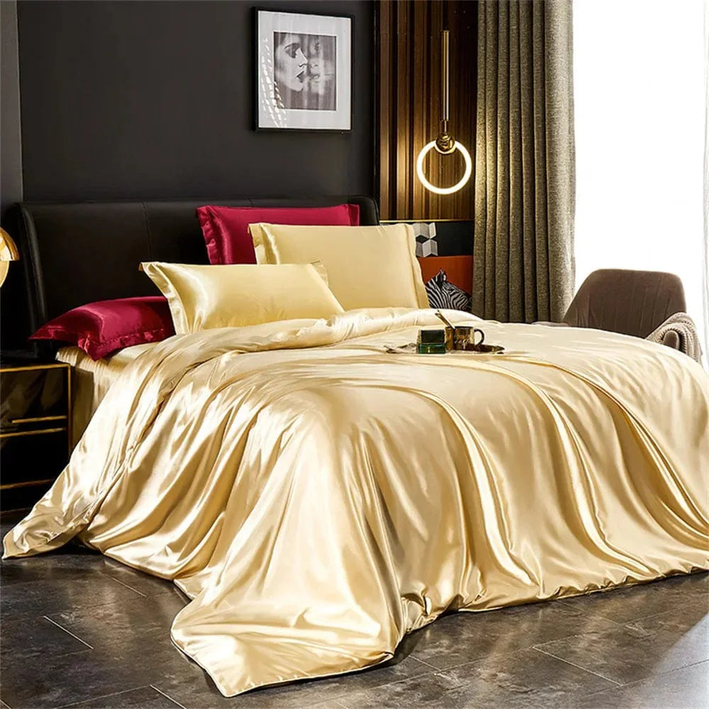 Luxury silk satin bedding set with solid duvet cover, pillowcases, and bed sheet in elegant design for king, queen, or twin beds.
