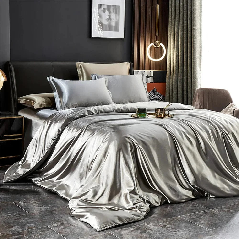 Luxury silk satin bedding set with a solid duvet cover, pillowcases, and bed sheet in elegant satin for king, queen, or twin beds.
