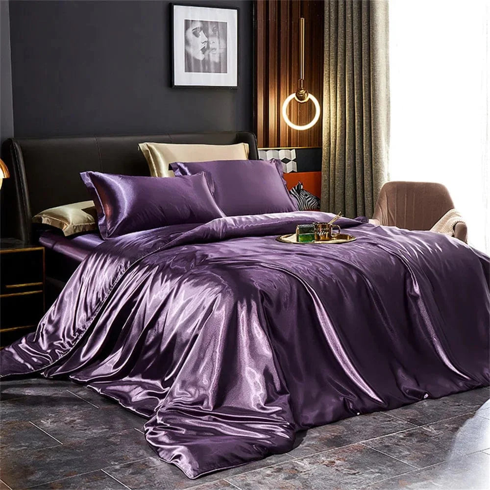 Luxury silk satin bedding set with duvet cover, pillowcases, and bed sheet in solid color for king, queen, or twin size beds.