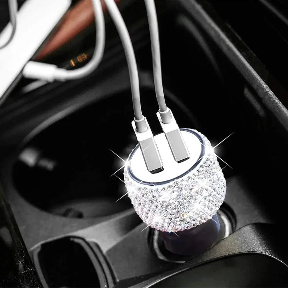 Sparkling Showlu Dual USB Car Charger with rhinestones, fast charging adapter for mobile devices, stylish and functional in car interior.