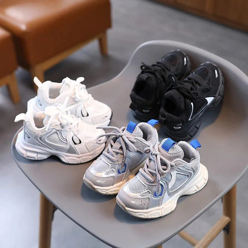 Kids breathable mesh sneakers by SHOWLU FASHION STORE, unisex children's basketball shoes with mesh upper and casual flat design.