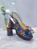 Black PU Nigerian women's party shoes with square heels, stylish African fashion footwear for spring and summer events.