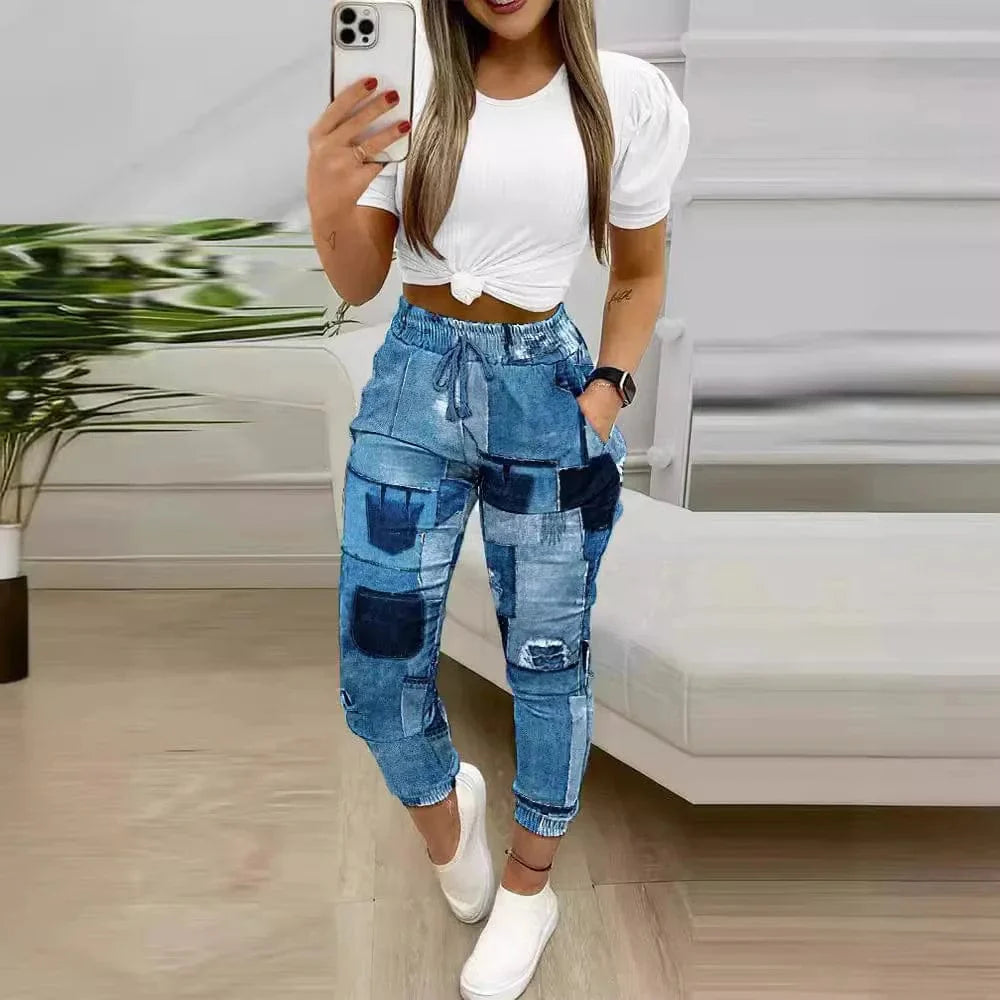 Shuangfuxiang women's printed two-piece casual short sleeve suit with loose trousers, perfect for spring and summer fashion.