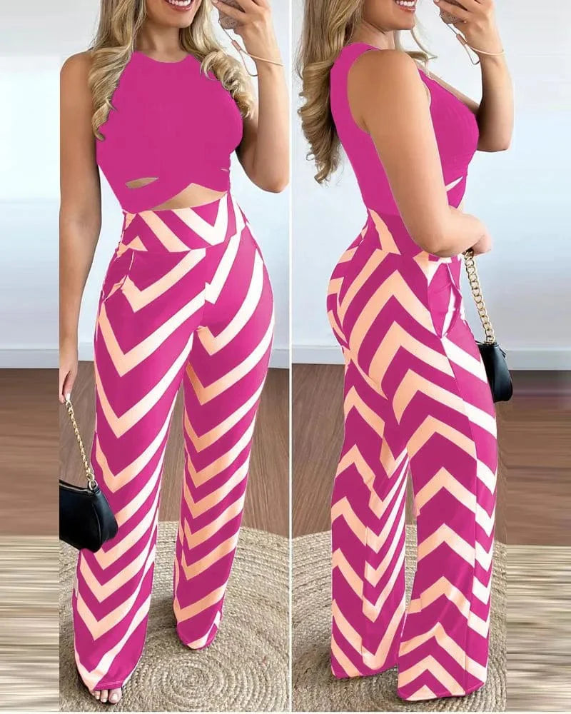 Owner Girl Women's 2-piece set with a printed sleeveless top and slim trousers, perfect for spring and summer office wear.