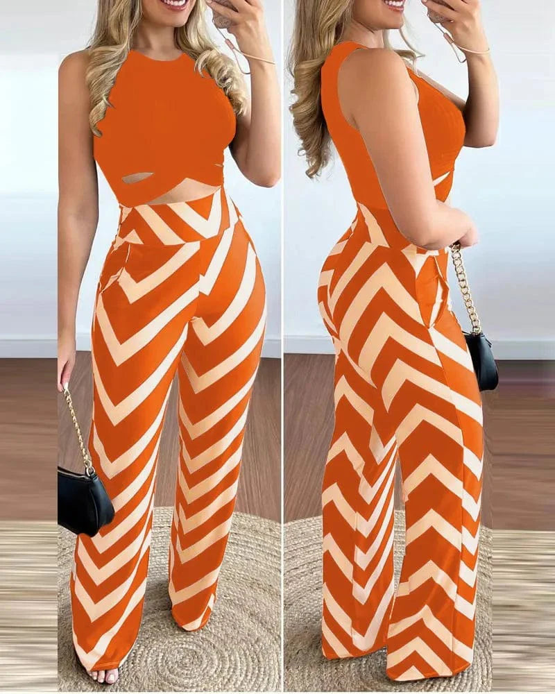 Owner Girl Women's 2-piece set featuring a sleeveless printed top and slim trousers, perfect for spring-summer fashion.