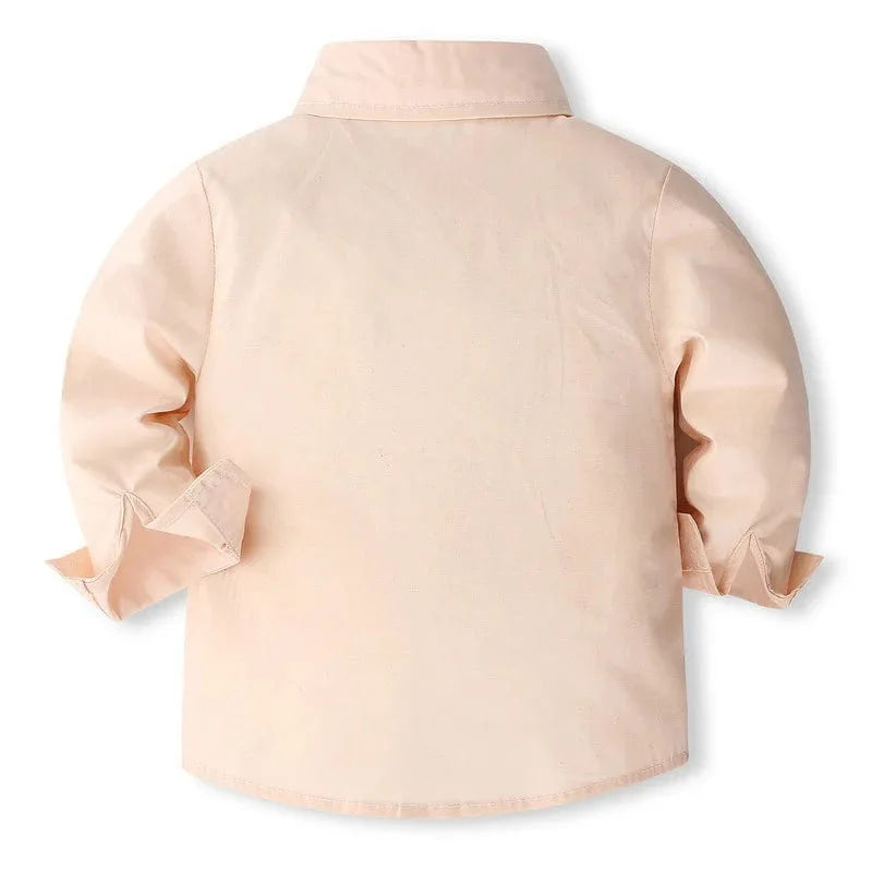 Toddler boy in Showlu Fashion cotton long-sleeve shirt and pants set, stylish spring boy's gentleman outfit with straps and tie detail