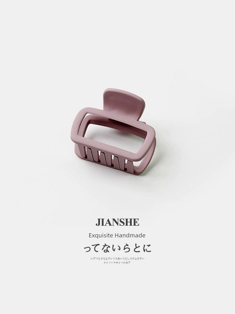 Square shark-shaped hair clip by Showlu Fashion, minimalist wild hair accessory for loose or styled hair.