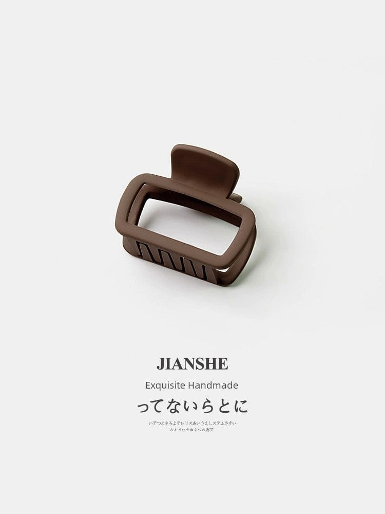 Showlu Fashion Square Shark Hair Clip with minimalist wild design, perfect for securing loose hair stylishly.