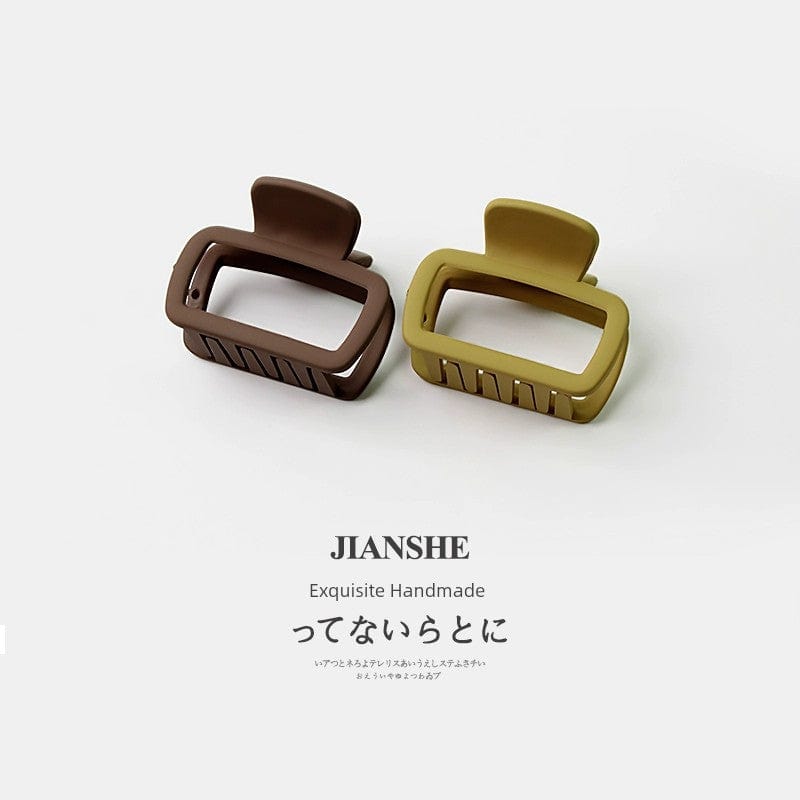 Square-shaped Shark Hair Clip by Showlu Fashion Store, minimalist wild hair accessory for securing loose hair.