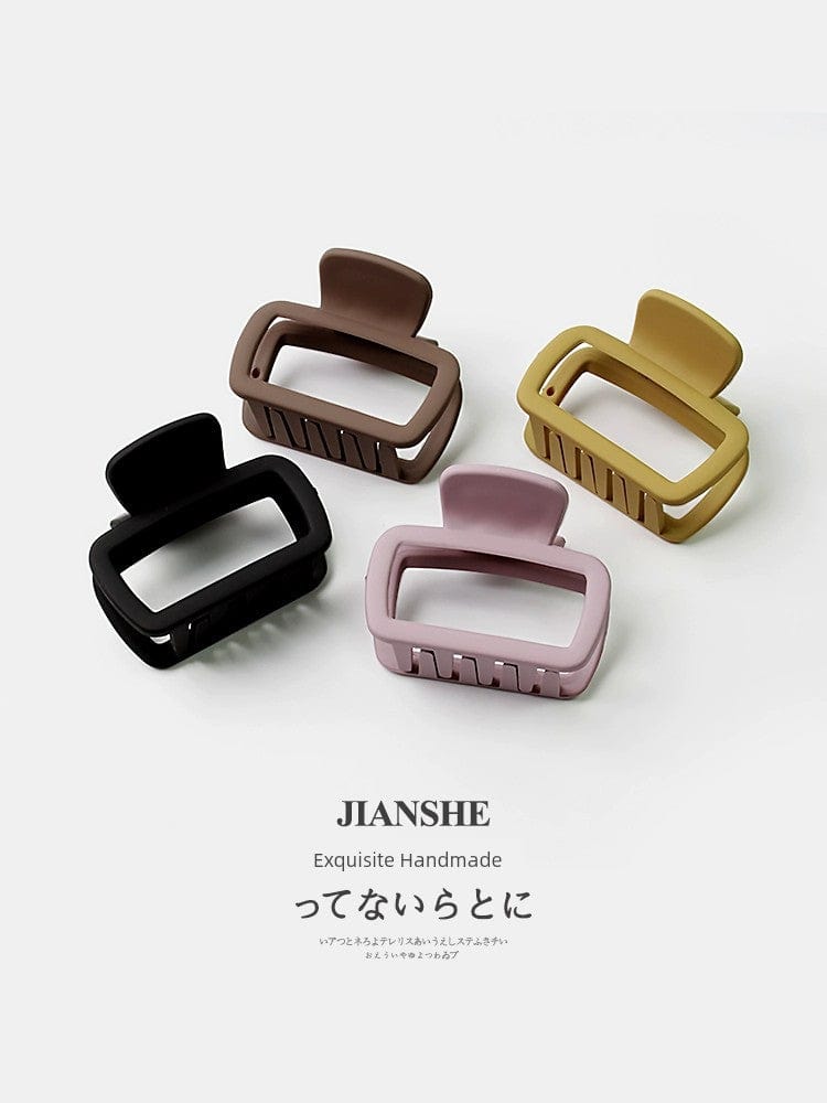 Showlu Fashion Square Shark Hair Clip with minimalist wild design, perfect for securing loose hair.