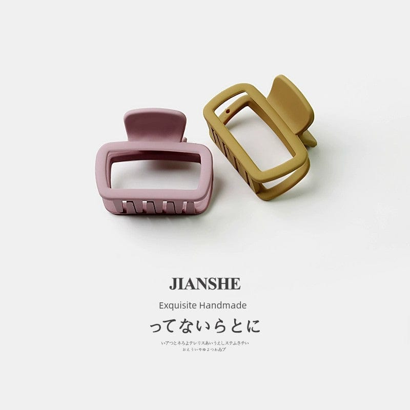 Showlu Fashion Square Shark Hair Clip featuring a minimalist wild shark design for securing loose hair.