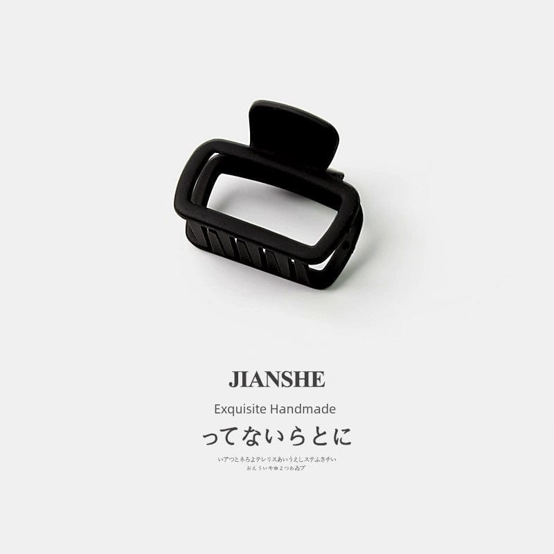 Showlu Fashion Square Shark Hair Clip with minimalist wild shark design, perfect for securing loose hair.