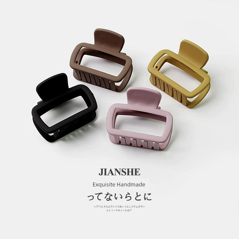 Showlu Fashion Square Shark Hair Clip in minimalist wild style, featuring a simple square-shaped shark design for loose hair.