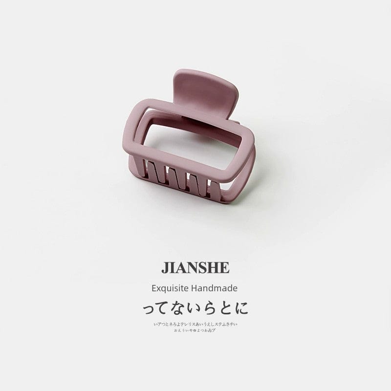 Showlu Fashion Square Shark Hair Clip with minimalist wild shark design, perfect for securing loose hair in a stylish way.