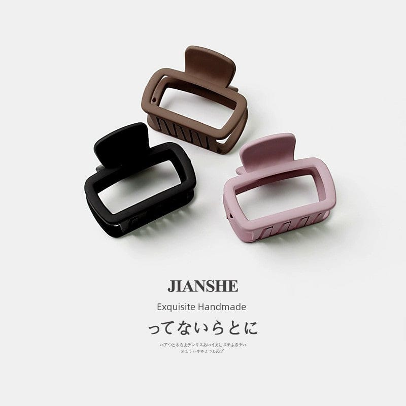 Square-shaped Shark hair clip from Showlu Fashion, a minimalist wild hair accessory for securing loose hairstyles.