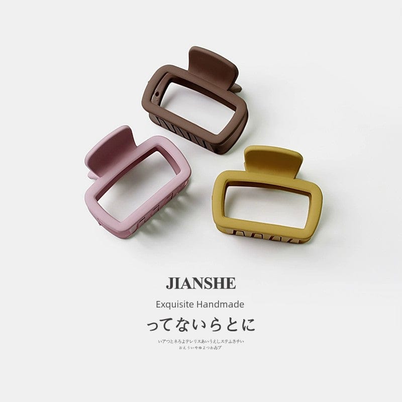 Showlu Fashion Square Shark Hair Clip featuring a minimalist wild shark design, made of metal for secure hair styling.