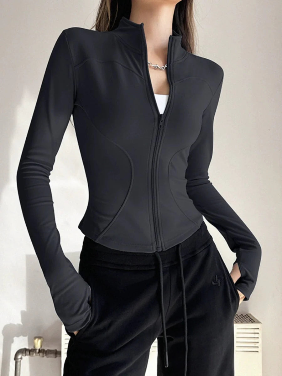 Showlu Women's stand collar yoga jacket with zipper, quick-dry fabric, long sleeves, slim fit, suitable for running, training, and casual wear.