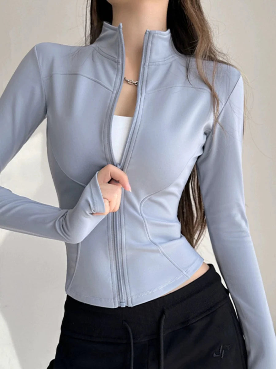 Showlu Women's stand collar yoga jacket with zipper, long sleeves, and quick-dry fabric, ideal for running and workout training.