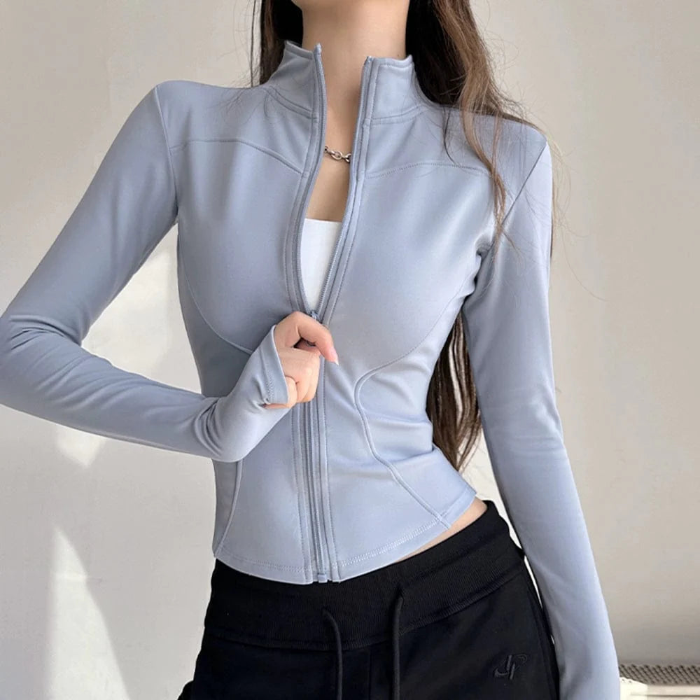 Showlu Women's stand collar yoga jacket with long sleeves, quick-dry fabric, slim fit, perfect for running, training, and casual workouts.