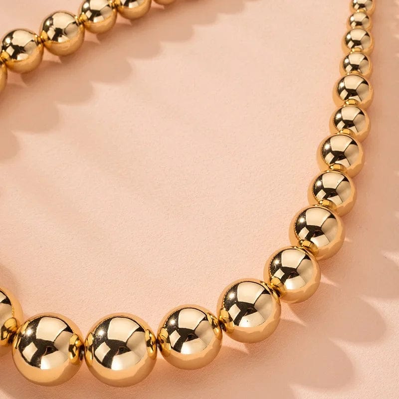 Gold ball beads chain necklace with steampunk gothic style, featuring a choker design for women and men, trendy fashion jewelry.
