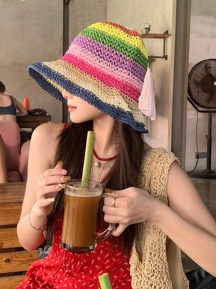 Women's rainbow straw sun hat with wide brim, stylish fedora design, perfect for beach and summer outdoor protection.