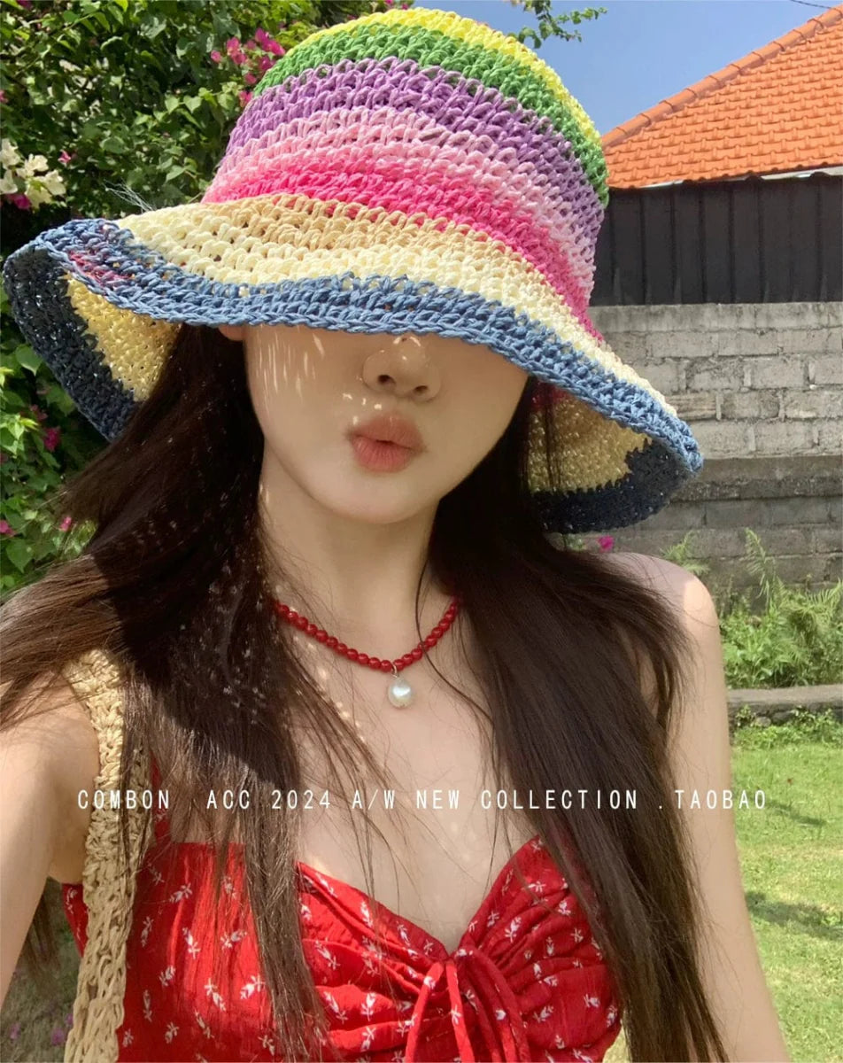 Women's rainbow straw sun hat with wide brim, stylish beach fedora for summer sun protection and fashionable outdoor wear