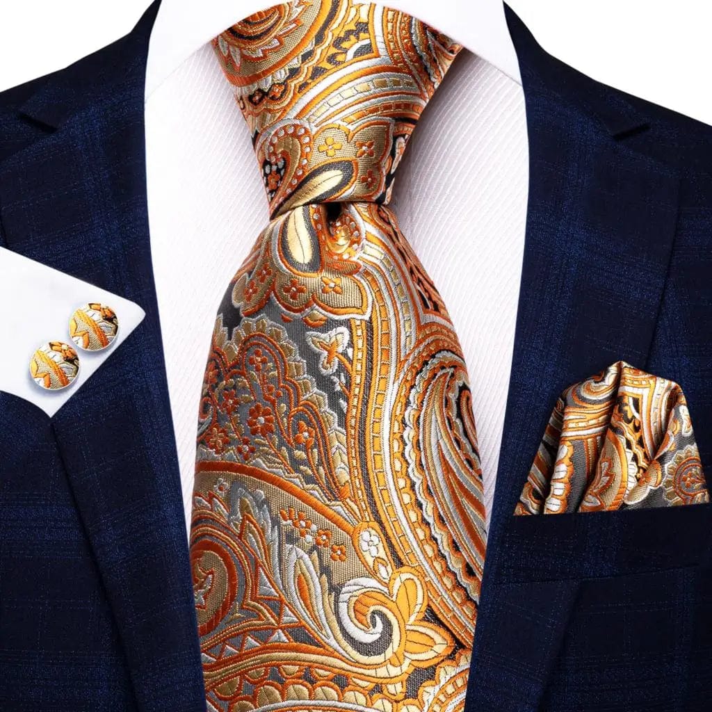 Elegant orange silk necktie set with matching pocket square and cufflinks, perfect for men's formal or wedding attire.