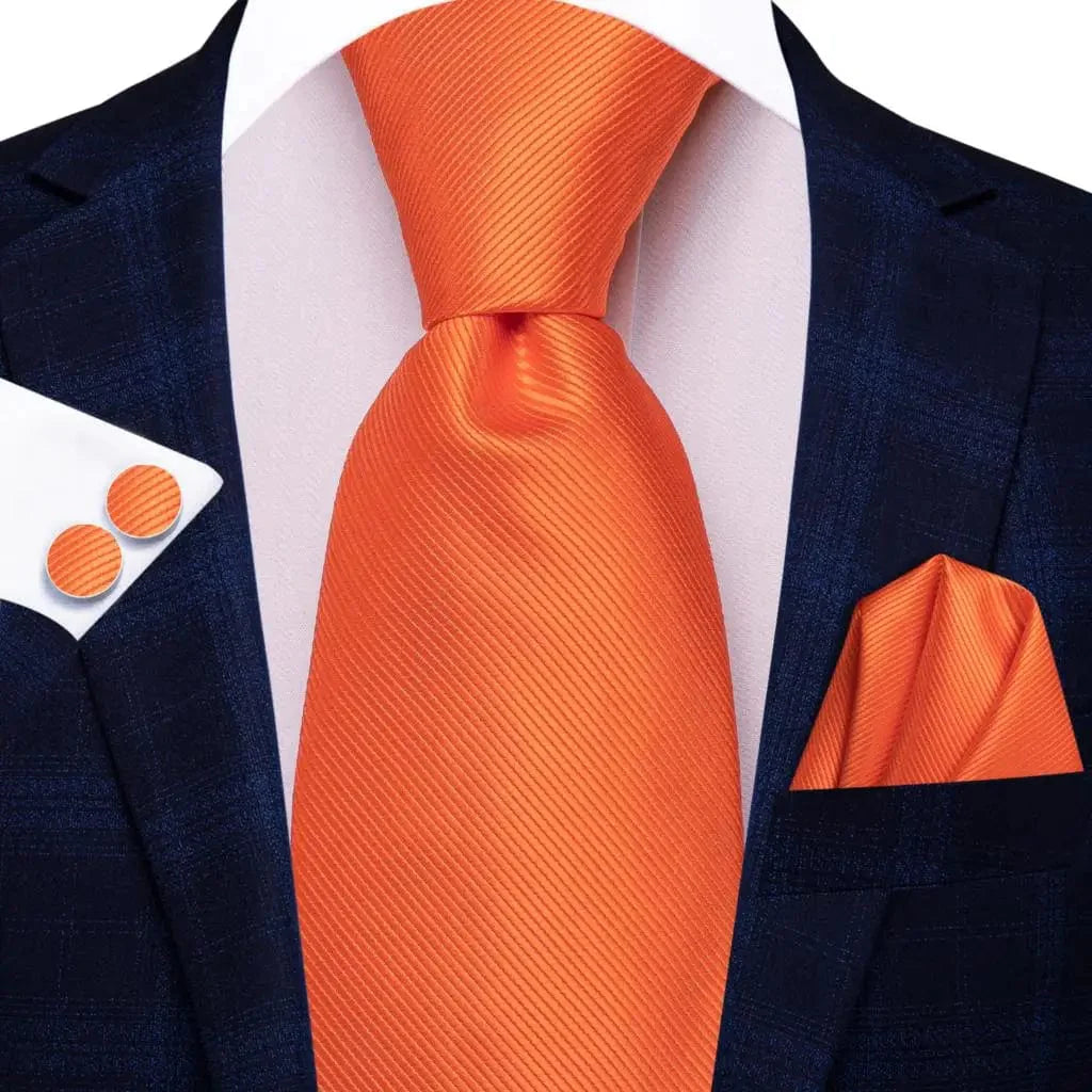 Orange silk striped men's necktie set with pocket square and cufflinks, elegant wedding accessory for grooms and formal occasions