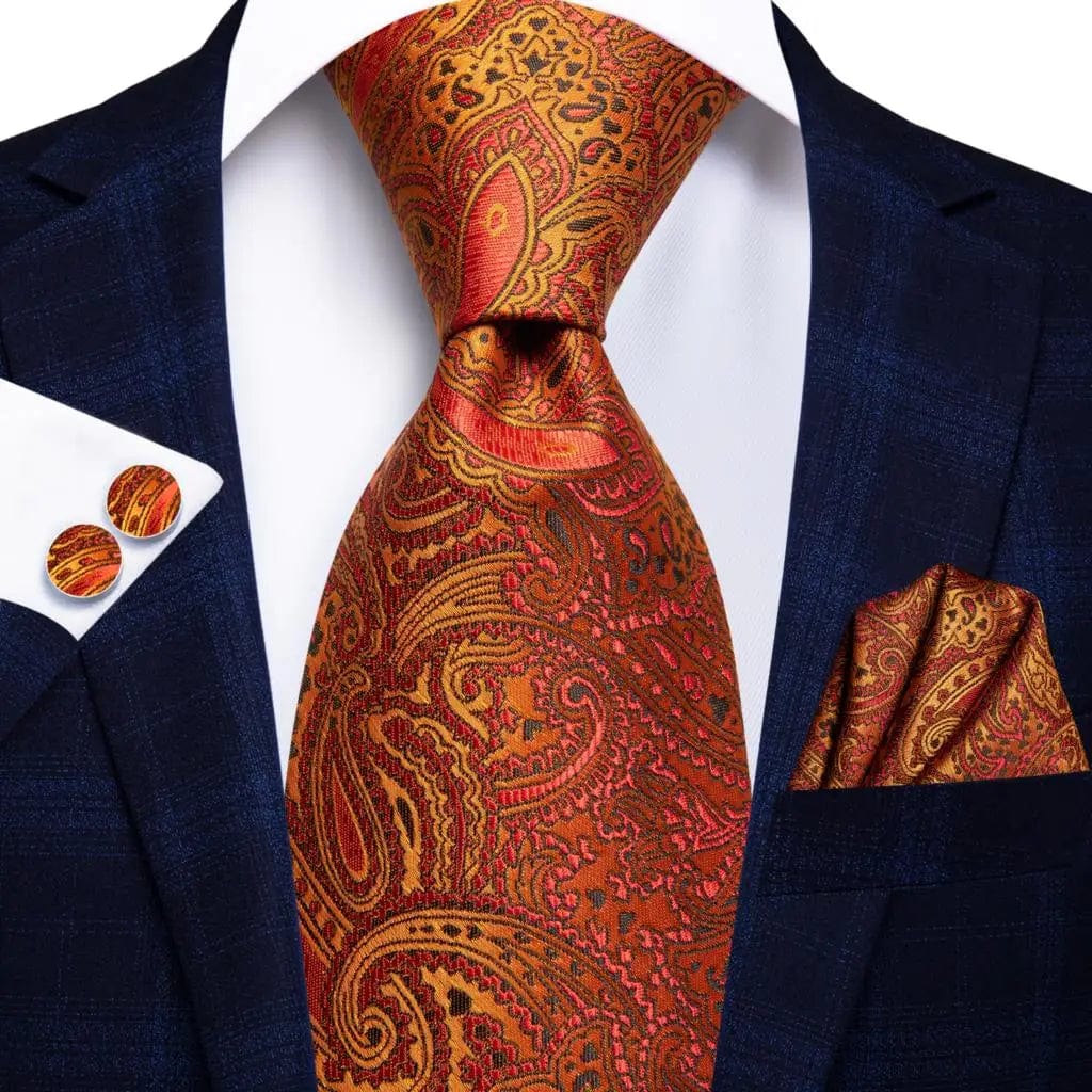Elegant orange silk necktie set with matching pocket square and cufflinks, ideal for men's formal and wedding attire.