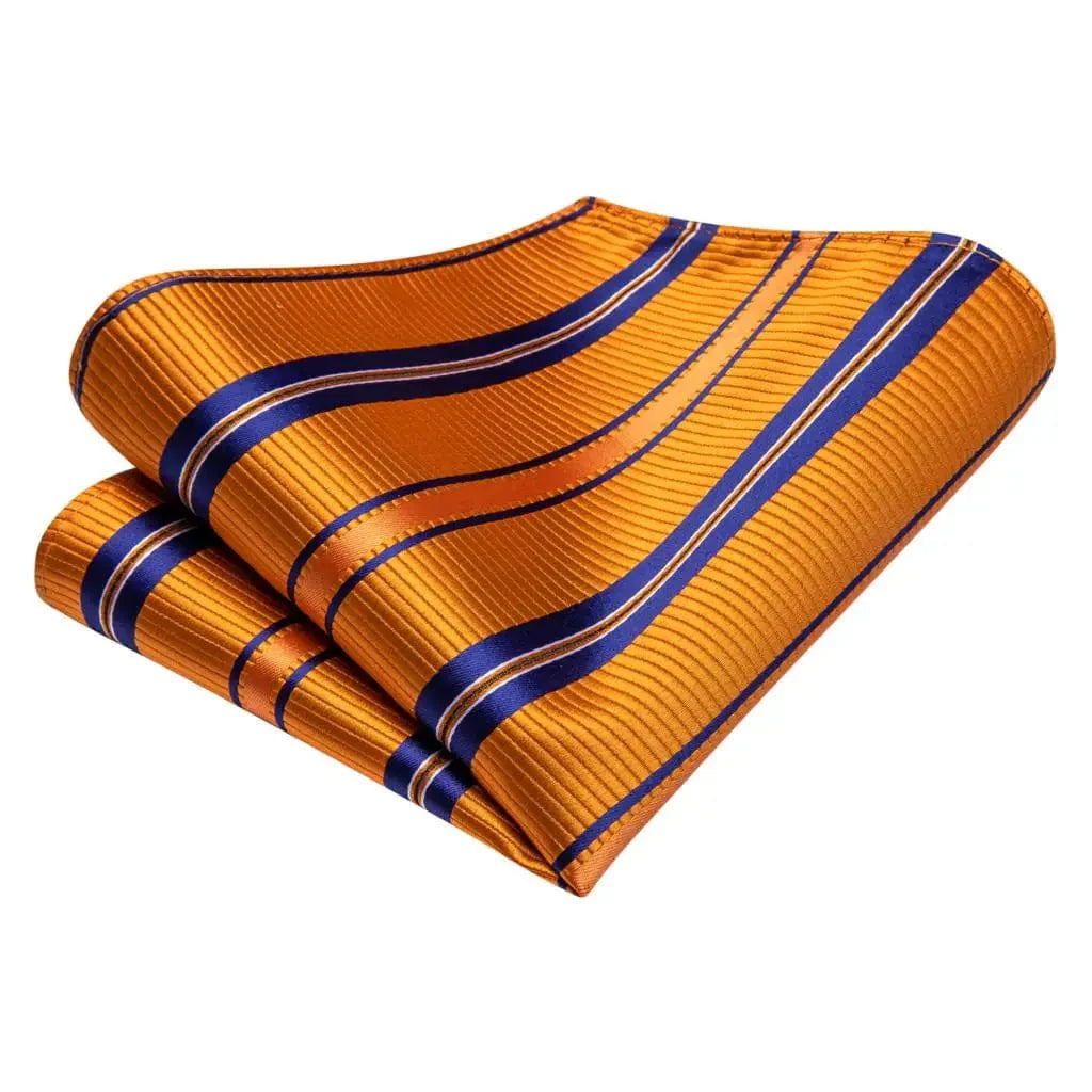Elegant orange silk necktie set with striped design, matching pocket square and cufflinks for men's wedding or formal wear.