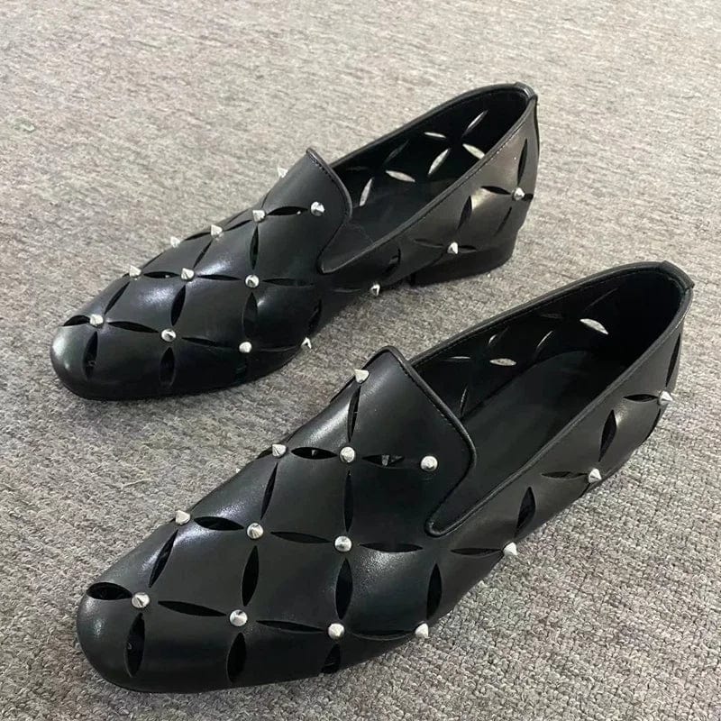 Black cowhide leather men's loafers with spiked accents, stylish hollow-out design, breathable and casual for summer wear.