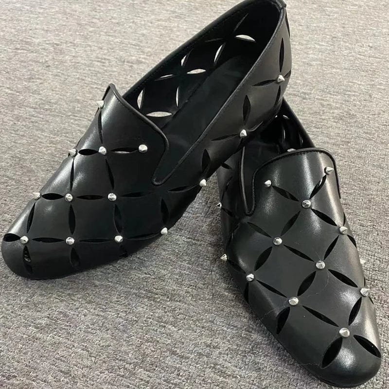 Black spiked cowhide leather loafers for men with hollow-out design, stylish breathable summer shoes for casual or business wear.